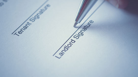 A person signing under 'Landlord Signature'